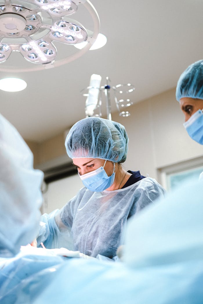 services-05 Doctor Operating A Patient 4421494